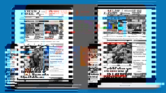 Bild på MacBook med Iphone som har en expressen tidningssida uppe