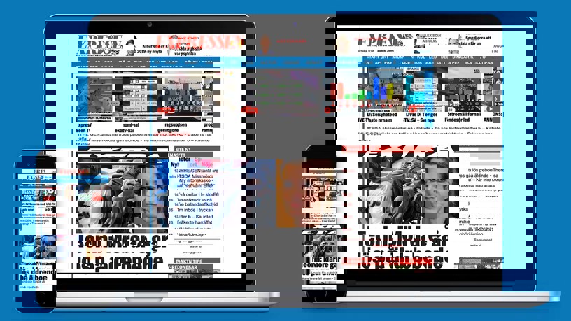 Bild på MacBook med Iphone som har en expressen tidningssida uppe